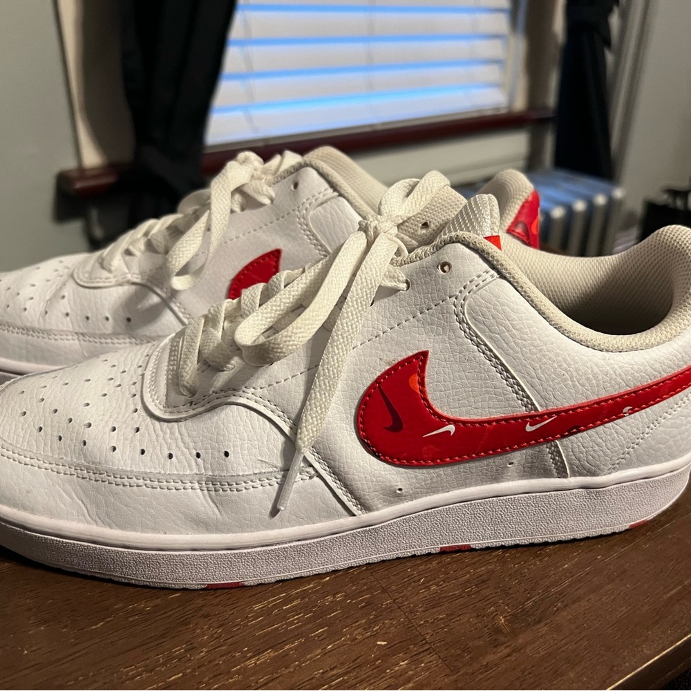 Nike red swoosh low top